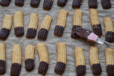 Freshly baked shortbread buisquits brushed with chocolate