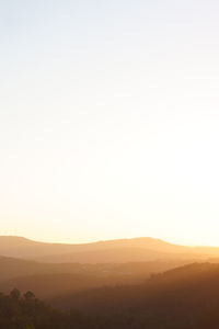 Scenic view of mountains on sunset