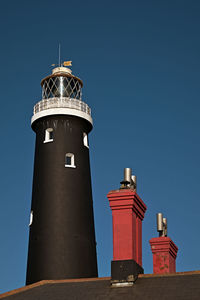 Low angle view of lighthouse against sky