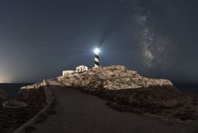 Scenic view of sea against sky at night