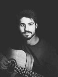 Young man playing guitar