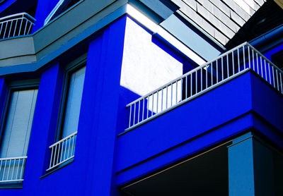 Low angle view of blue residential building