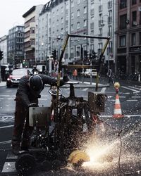 Man walking on street in city