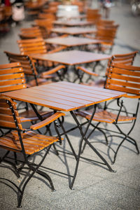 High angle view of empty chairs and tables in restaurant