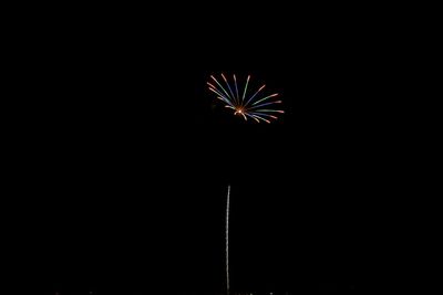 Firework display at night