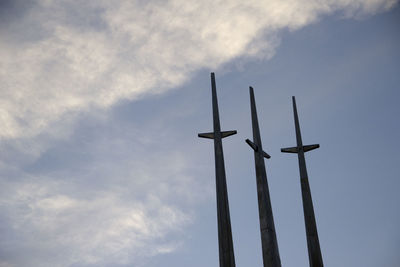 Low angle view of wind turbine against sky