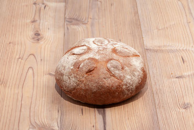 High angle view of bread on cutting board