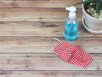 High angle view of bottles on table