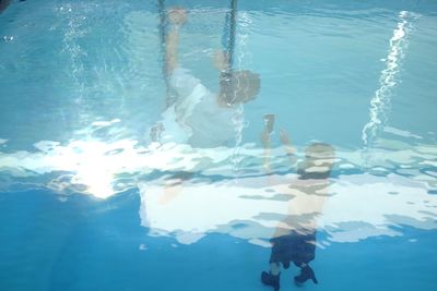 People swimming in pool