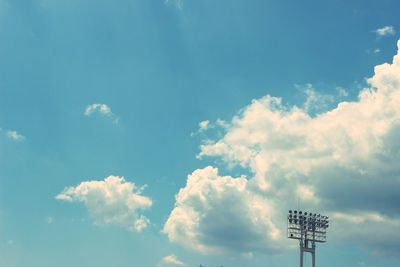 Low angle view of floodlight against sky