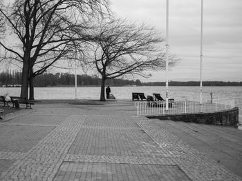 Empty bench on pier