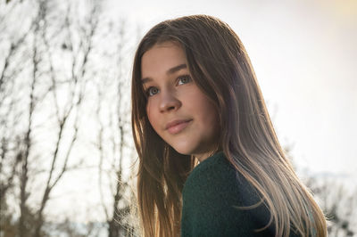 Portrait of a cute teenager girl in the park on a sunny day