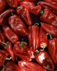 Full frame shot of red chili peppers for sale in market