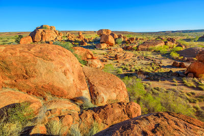 Scenic view of rock formations against clear sky