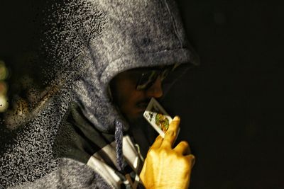 Close-up of person eating ice cream