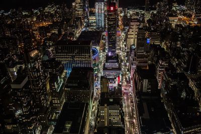 High angle view of illuminated buildings at night