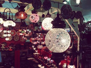 Illuminated lamp post at night