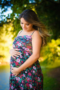 Pregnant young woman standing 