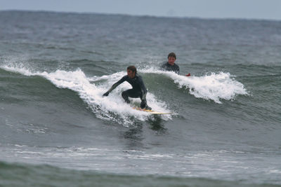 Man surfing in sea