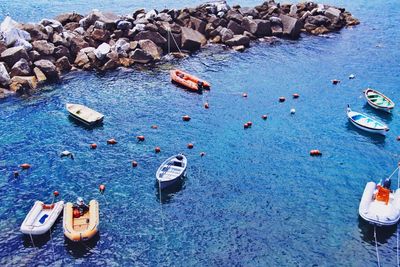 High angle view of boats moored in river