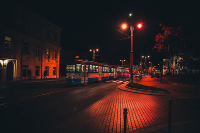 Illuminated street at night