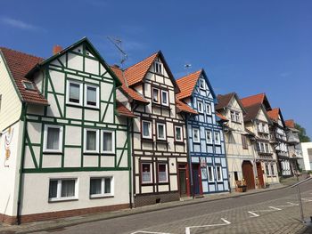 View of residential buildings against sky