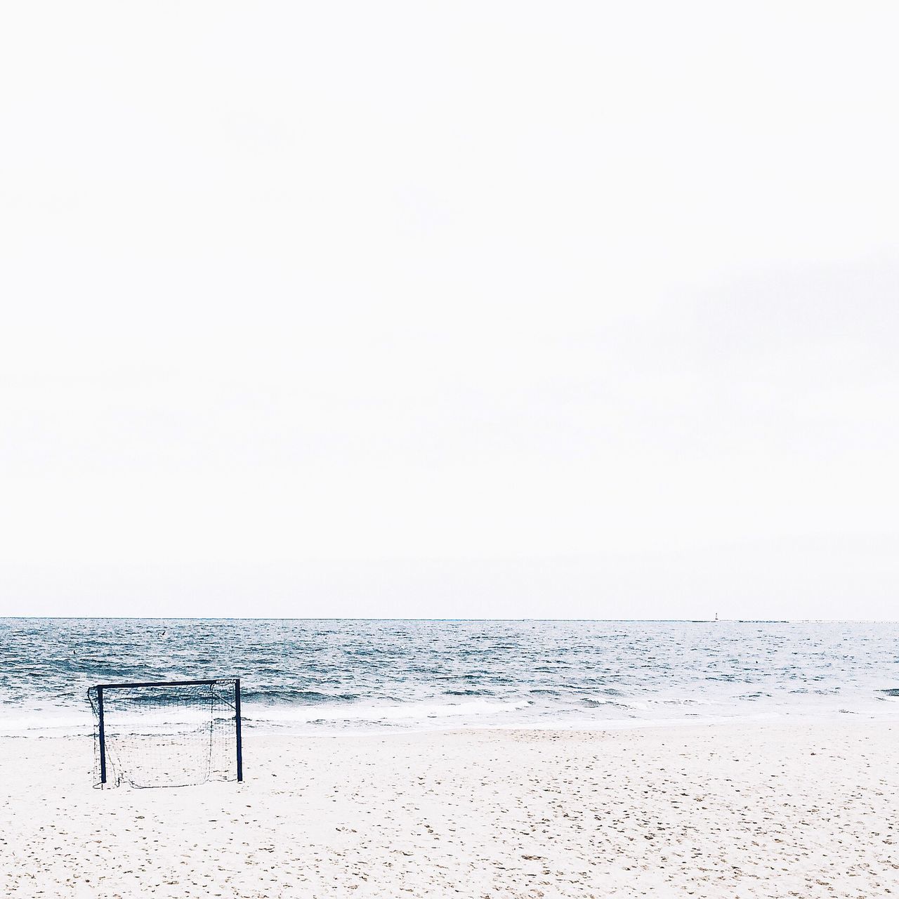 copy space, horizon over water, clear sky, sea, tranquil scene, water, tranquility, scenics, nature, beauty in nature, beach, idyllic, sky, day, outdoors, remote, shore, no people, calm, ocean