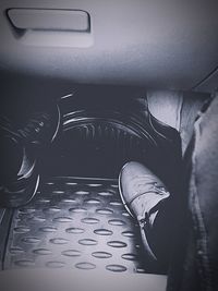 High angle view of shoes in car