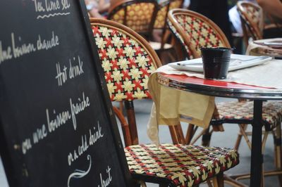 Empty chairs and tables in cafe