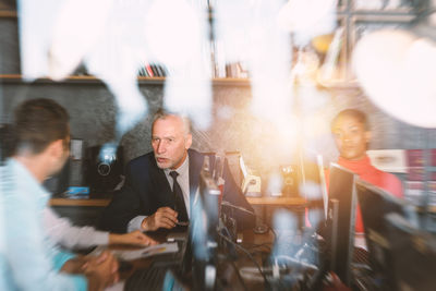 Blurred image of business people having discussion