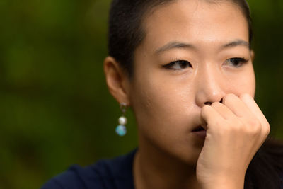 Close-up portrait of young woman