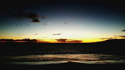 Scenic view of sunset over sea