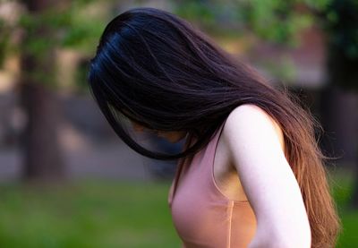 Side view of a young woman