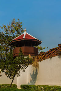 Low angle view of building against clear blue sky