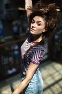 Portrait of beautiful woman standing outdoors