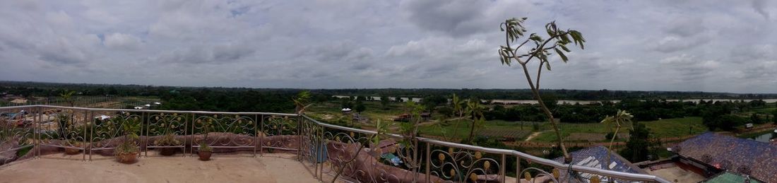 Panoramic view of mountain against cloudy sky