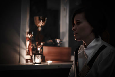 Portrait of young woman looking away
