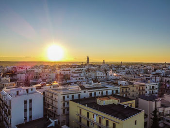 High angle view of townscape against sky during sunset