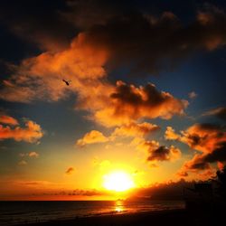 Scenic view of sea at sunset