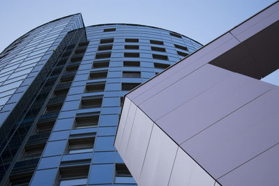 Low angle view of modern building against clear sky