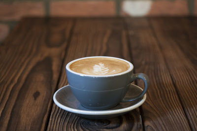 Close-up of cappuccino on table