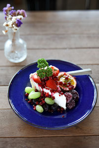High angle view of salad in bowl on table