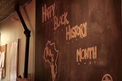 Close-up of text on wall