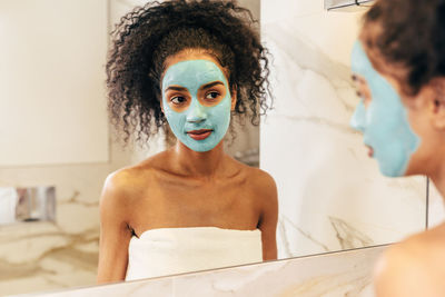 Portrait of woman in bathroom