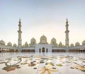 Low angle view of mosque against clear sky