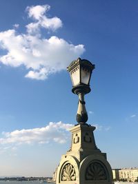 Low angle view of statue against sky