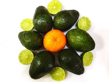 Close-up of fruits against white background