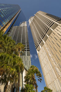 Low angle view of skyscrapers against sky