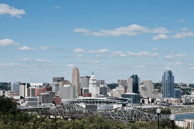 Buildings in city against sky