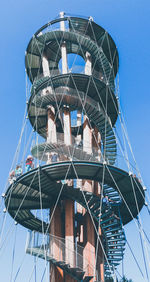 Low angle view of ferris wheel against sky